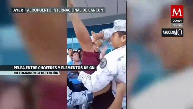 Pelea entre elementos de la GN y taxistas de Cancún