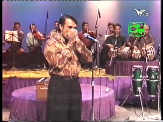 Mouth organ play  from Torana Archives