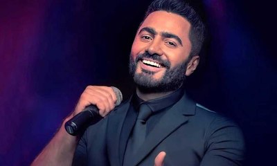 تامر حسني وزوجته بسمة يعلنان طلاقهما