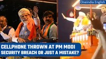 Karnataka: Phone thrown at PM Modi during roadshow; police says no ‘ill-intention’ | Oneindia News