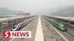 China-Laos Railway bustling with passengers amid holiday travel rush