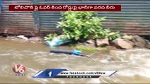 Water Logged At Towlichowki Flyover, Bikers Facing Problems With Water Flow | Hyderabad | V6 News