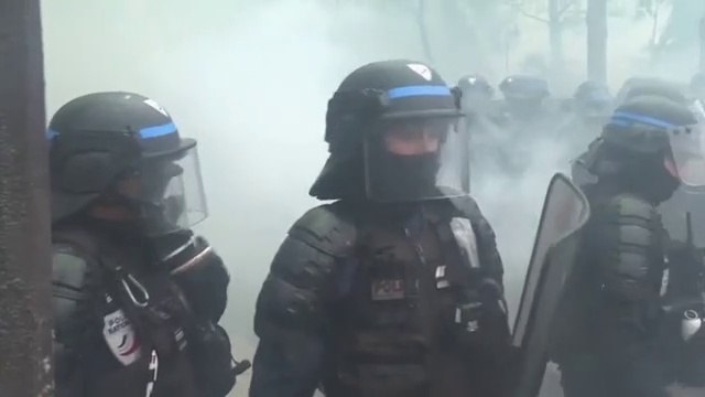Moment tear gas and smoke bombs fired at protestors in Paris