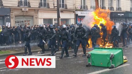 French police face off with anarchists on May Day