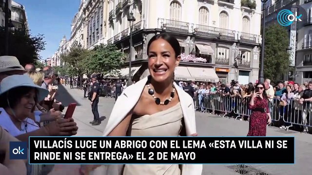 Villacís luce un abrigo con el lema «Esta Villa ni se rinde ni se entrega» el 2 de Mayo