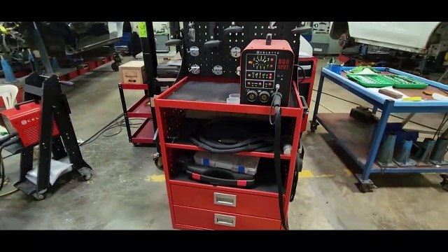 Side damage repair with Celette spotter dent puller