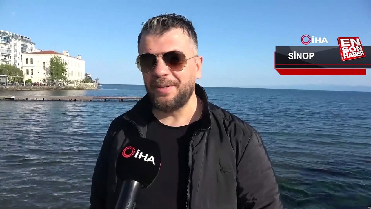 Denize düşürdüğü telefonunu kurtarmak için arkadaşını denize sarkıttı