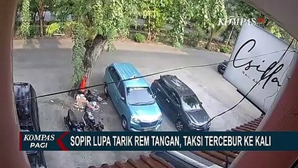 Lupa Rem Tangan, Taksi Mundur hingga Kecebur ke Kali