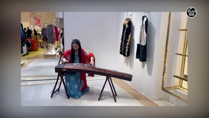 Girl plays instrument 2