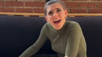 Woman goes through 4 different emotions while unboxing her birthday surprise
