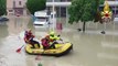 Firefighters row through submerged streets as Italy floods kill at least two