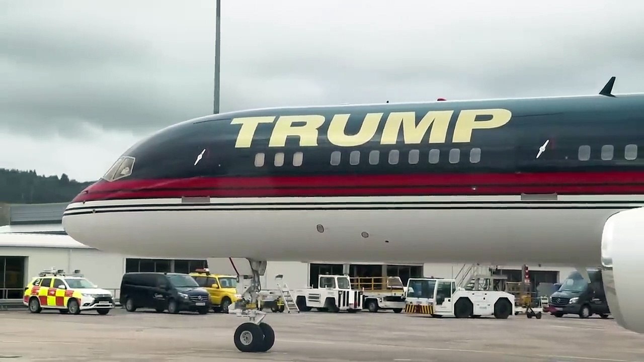 Trump greets staff as he arrives at his Aberdeenshire golf resort after landing in Scotland saying 'it's great to be home':  Bagpipe Welcome As Donald Trump Lands In Scotland