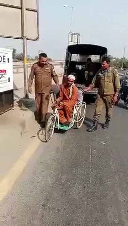 fake bagger on wheel chair walked on food by police