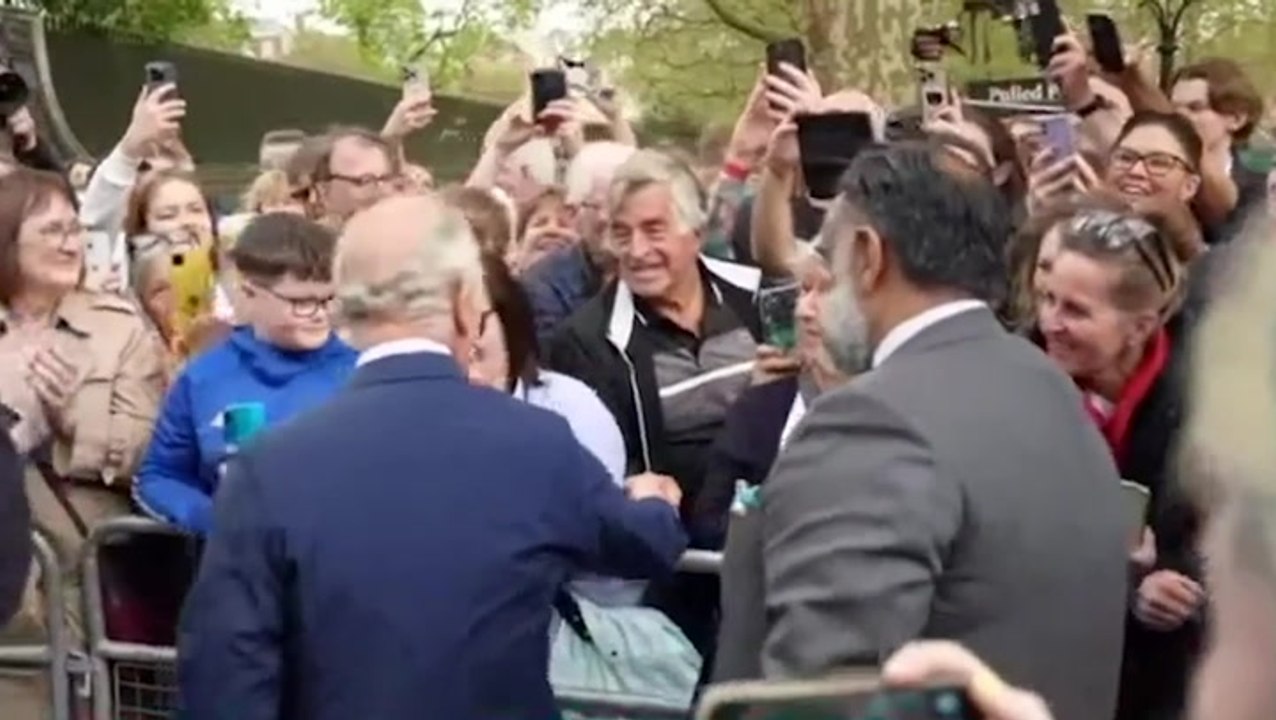 King Charles meets royal fan who says he was at...