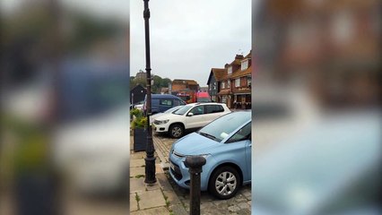 Man spotted being rescued from up to his waist in thick mud