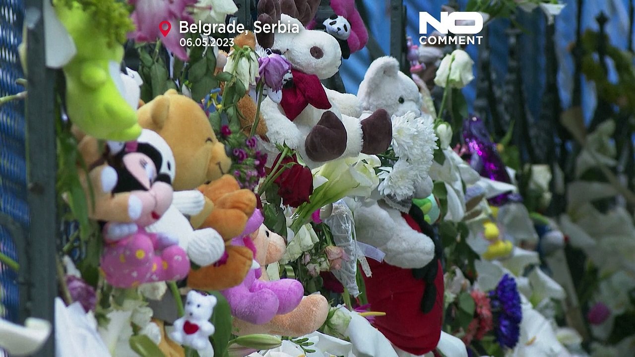 Serbs mourn those who died in two mass shootings