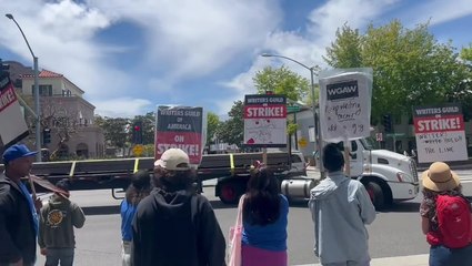 Watch: Striking writers block 18-wheeler from entering Sony studios