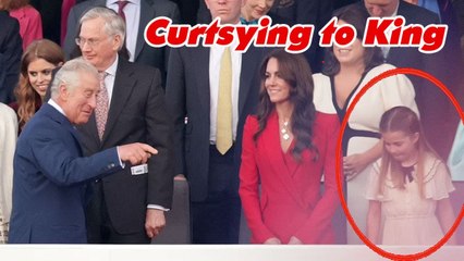 Sweet moment: Princess Charlotte curtsies to the new King Charles and nearly loses her footing