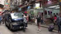Hong Kong: operai equilibristi sulle impalcature di bambù