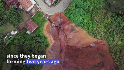 In Brazil, a damaged city lives on edge of abyss