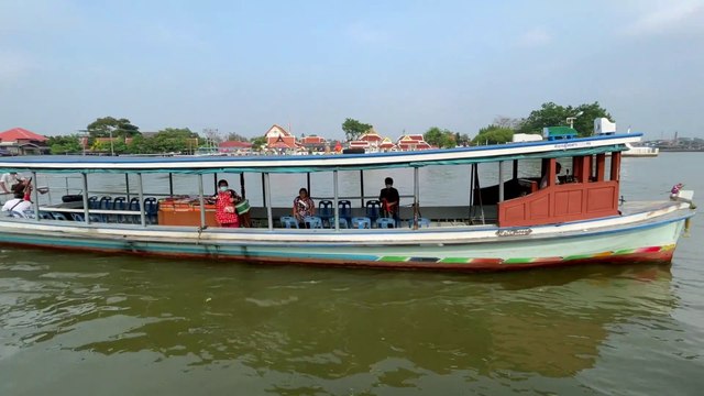 Barge and tugboats at Koh Kret Chao Phraya river in Thailand