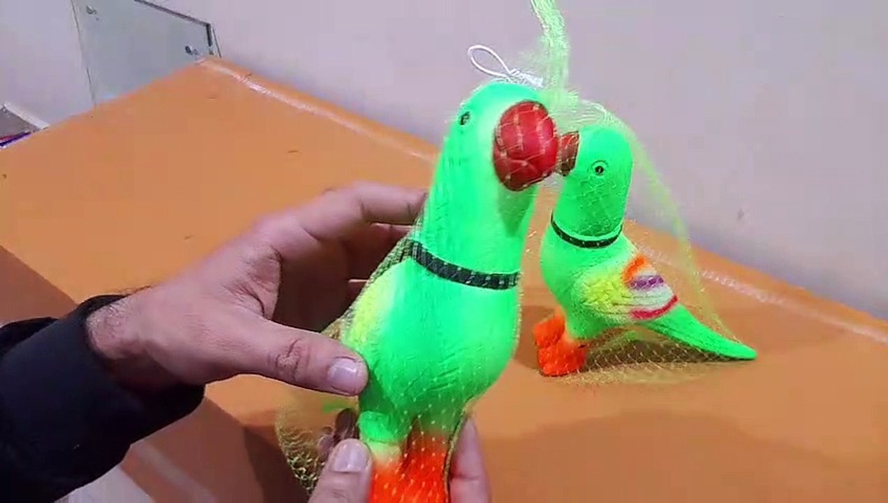 Unboxing and Review of Green Parrot Hand Punching Sound Tota for Kids Parrot Toys