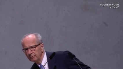 Watch: Protester throws cake at Volkswagen chairman during AGM
