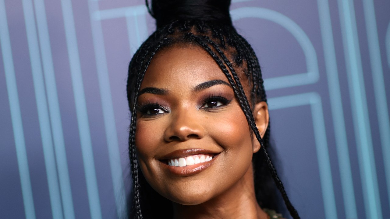 Gabrielle Union Wore an Itty-Bitty Orange String Bikini During a Steamy Pool Session With Dwyane Wade