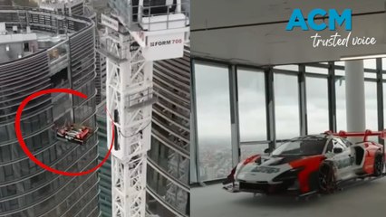 Millionaire has luxury car craned up to a 57th-storey parking spot