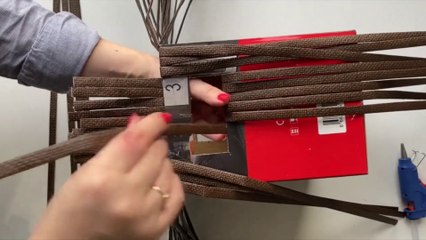 DIY Wicker basket made of wallpaper leftovers