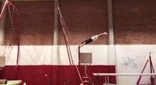 Gymnast Lands on Bar While Swinging on it in 360 Degrees Circles