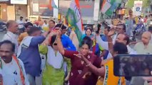Congressmen celebrate Karnataka victory, distribute sweets