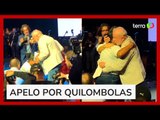 Mulher se ajoelha na frente de Lula pedindo ajuda para quilombolas: 'Nosso povo está morrendo'