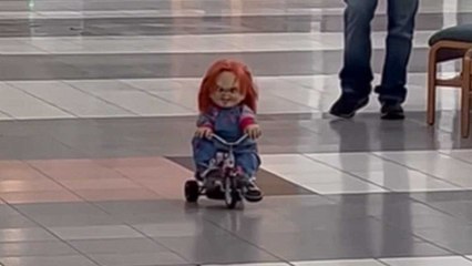 People at mall FREAK OUT on seeing creepy Chucky doll riding a tricycle on his own