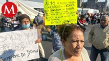 Padres de niños y jóvenes con síndrome de Down protestan sobre avenida 20 de Noviembre