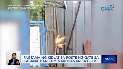 Pagtama ng kidlat sa poste ng gate sa Cabanatuan City, nakuhanan sa CCTV | Saksi