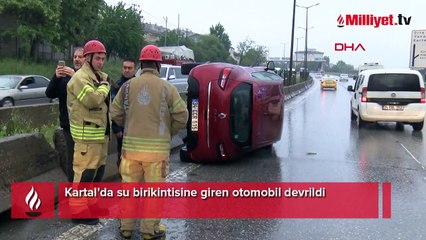 Kartal'da su birikintisine giren otomobil devrildi  