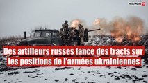 Des artilleurs russes lance des tracts sur les positions de l'armées ukrainiennes