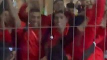 Morocco's football team singing & chanting with fans following historic WC win against Spain
