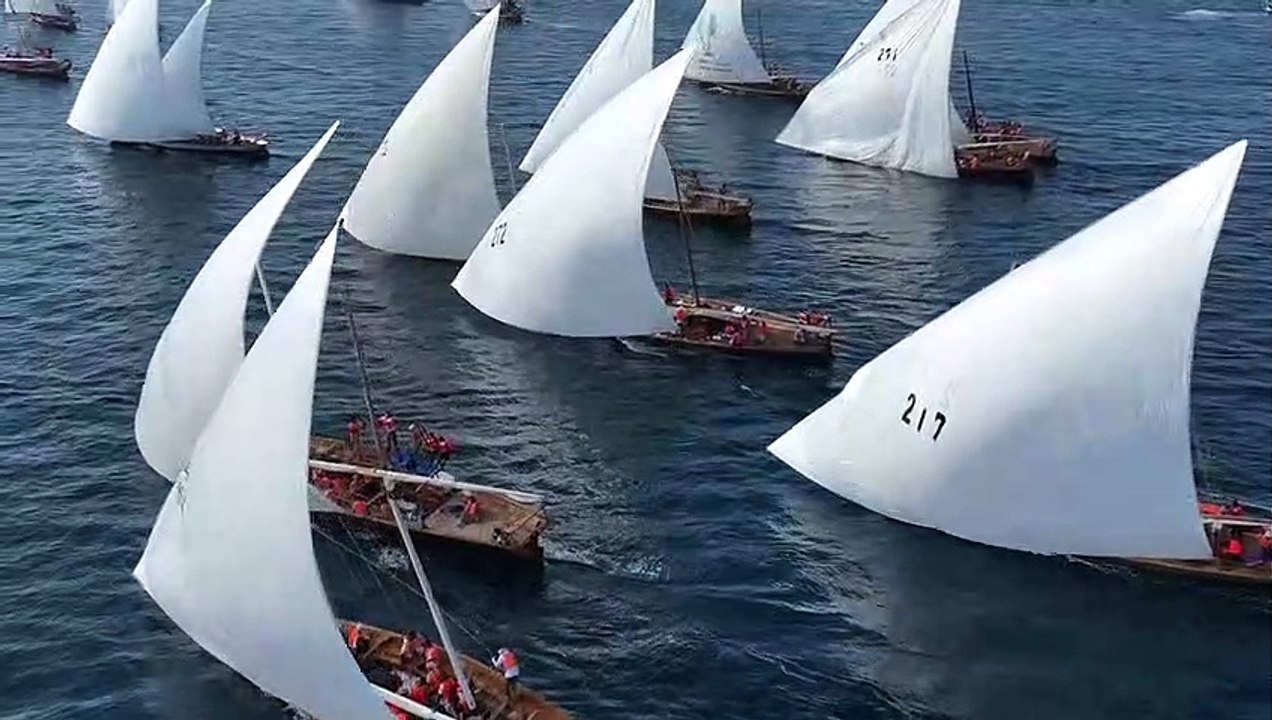 Boats on their journey back home from Sir Bu Na'air Island in what is traditionally called Al Gaffal or the return home