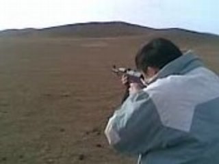 Amarsanaa shooting with AK47