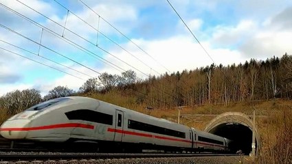 High Speed Train exits-enters tunnel.