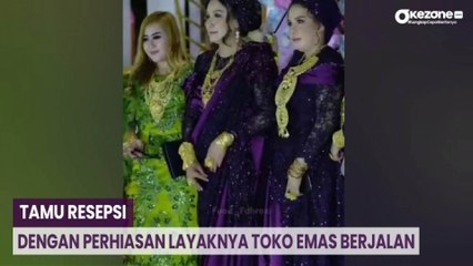 下载视频: Heboh Tamu Resepsi Nikahan dengan Perhiasan Layaknya Toko Emas Berjalan di Madura