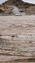 A Car crossing a river