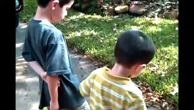 Jonathan Christopher & Anthony looking at a bug