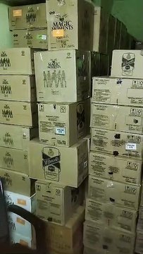 Fake postal parcel vehicle made for liquor smuggling, 350 boxes of English liquor recovered