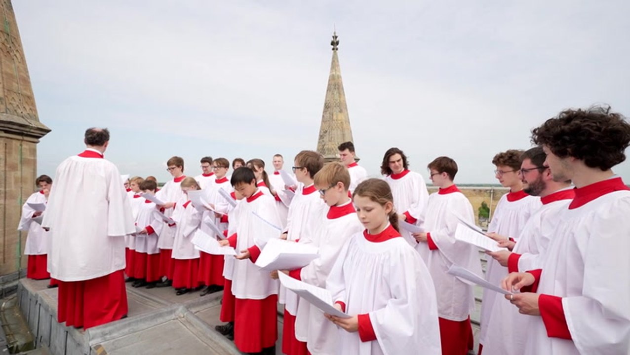 Choir sings from top of 160ft Cambridge college tower to continue 120-year-old tradition