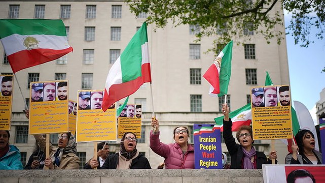 Demonstrators gather outside Downing Street to protest against Iran executions