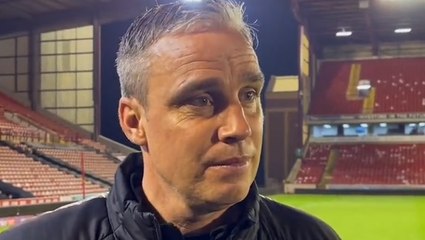 Barnsley boss Michael Duff swigs beer after reaching League 1 play-off final