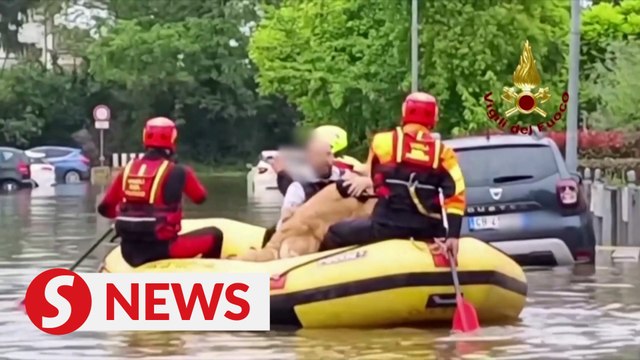 Italian firefighters evacuate stranded residents